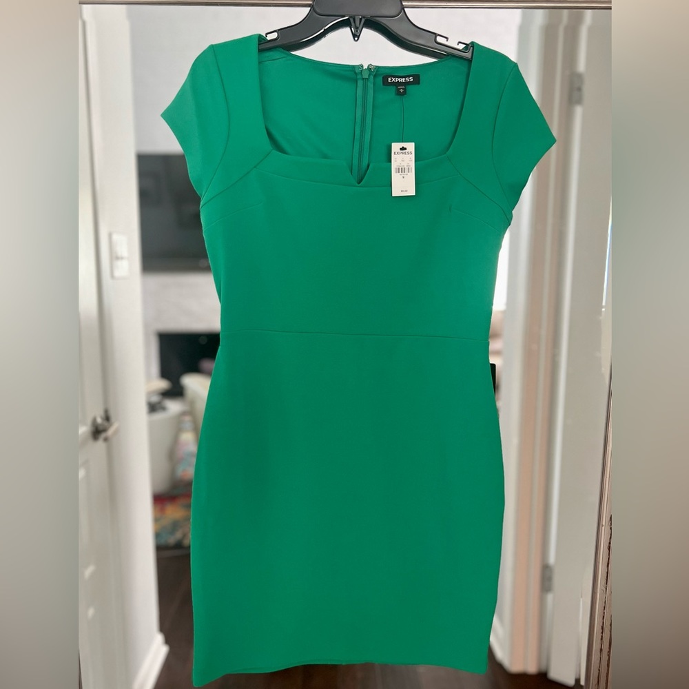 Green dress from Express. Never worn. Could be worn for business or cocktails.